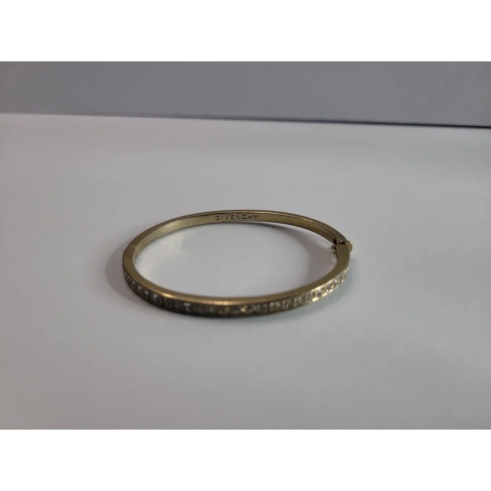 Vintage Givenchy Signed Gold Tone Clear Rhinestones Hinged Bangle Bracelet